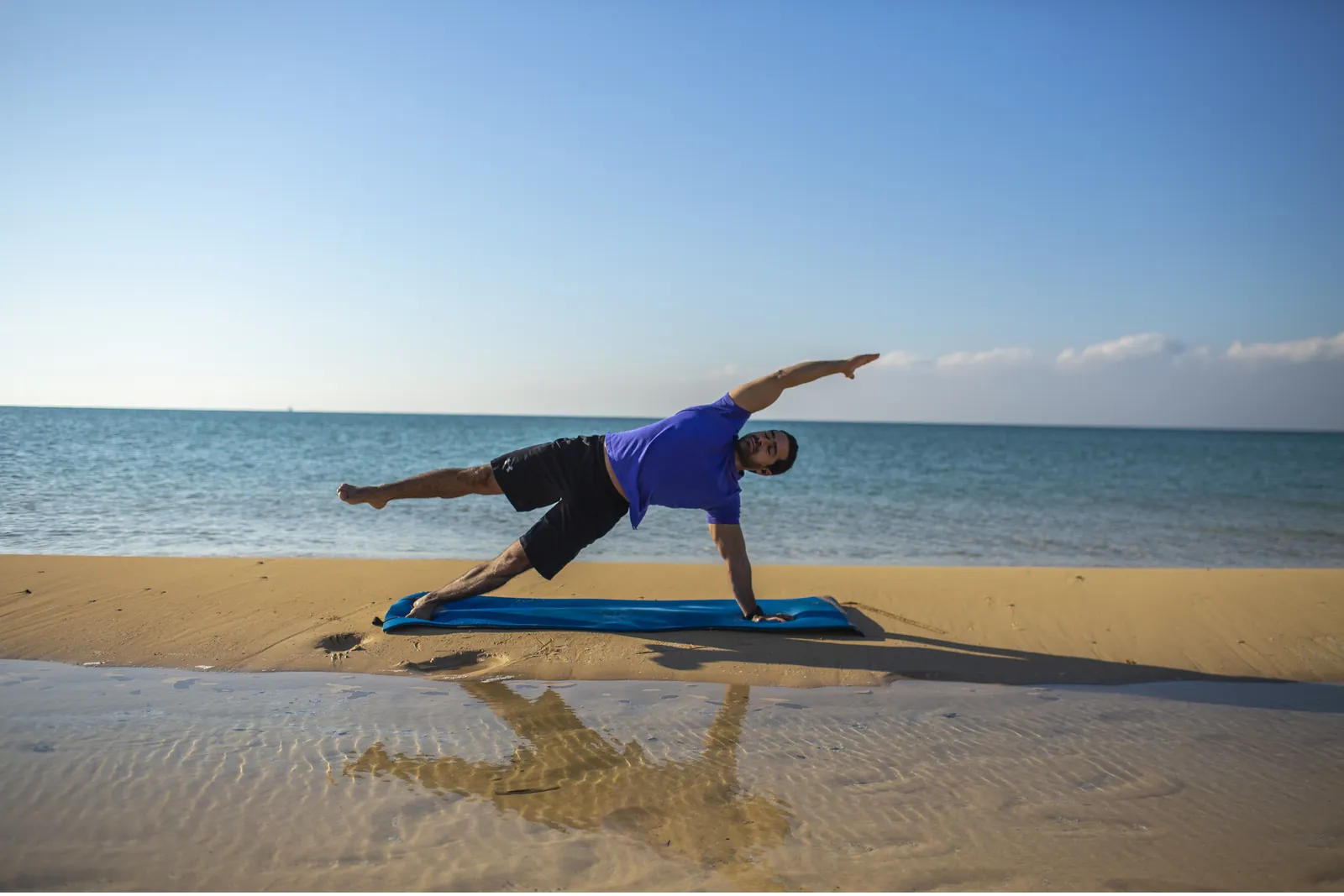 Morning yoga on the beach by the Red Sea